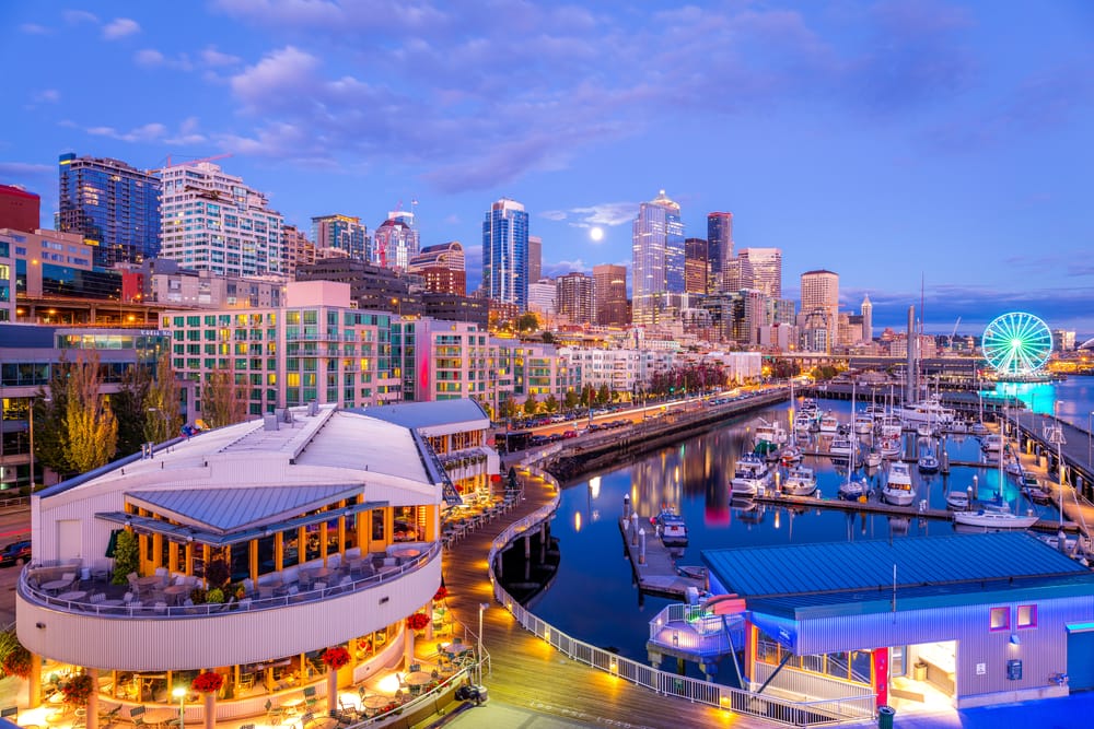 Downtown Seattle skyline lit up at night during fall events.